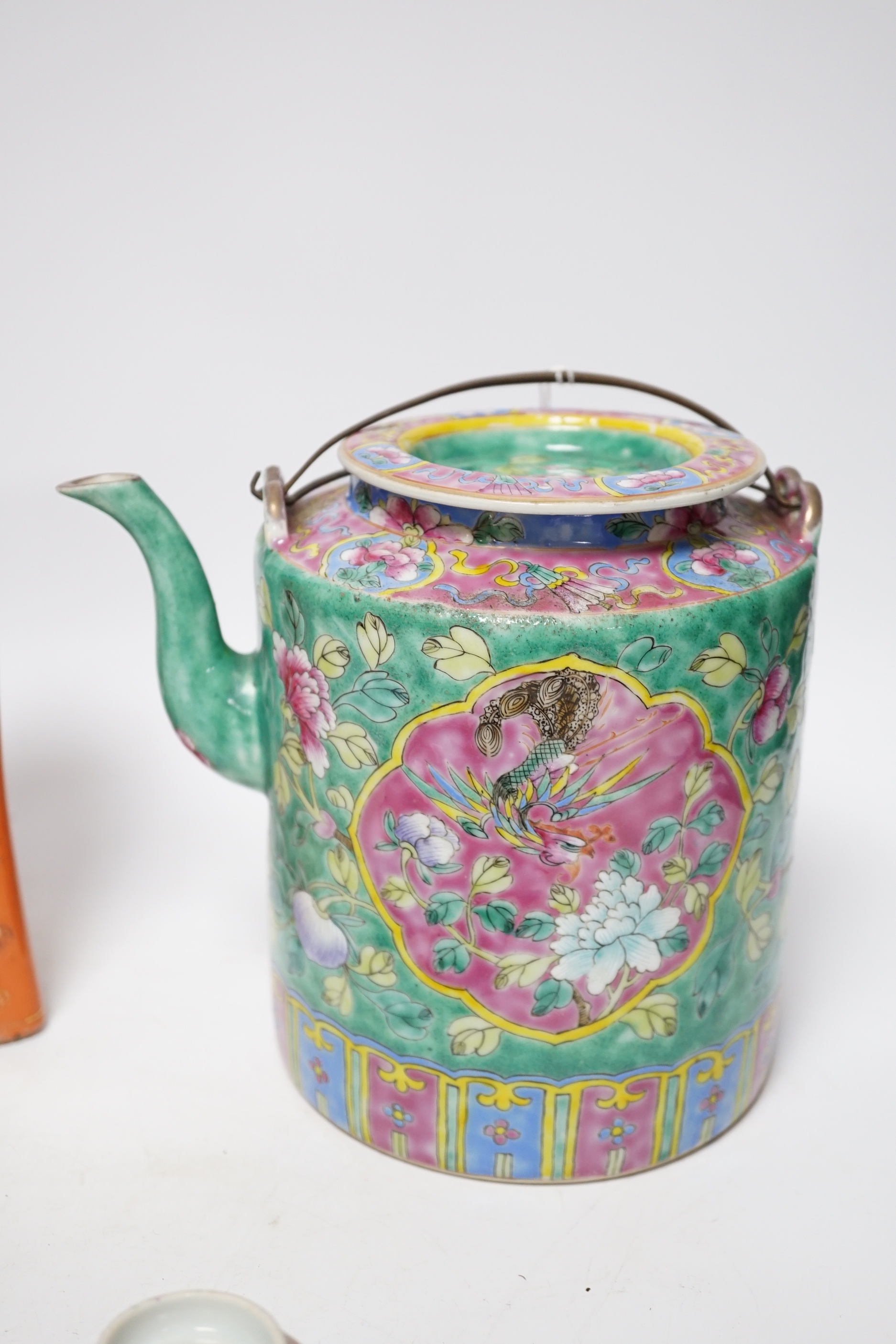 A Chinese Straits enamelled porcelain teapot and cover and seven similar tea bowls, Guangxu period and a pillow, teapot 18cm high including cover